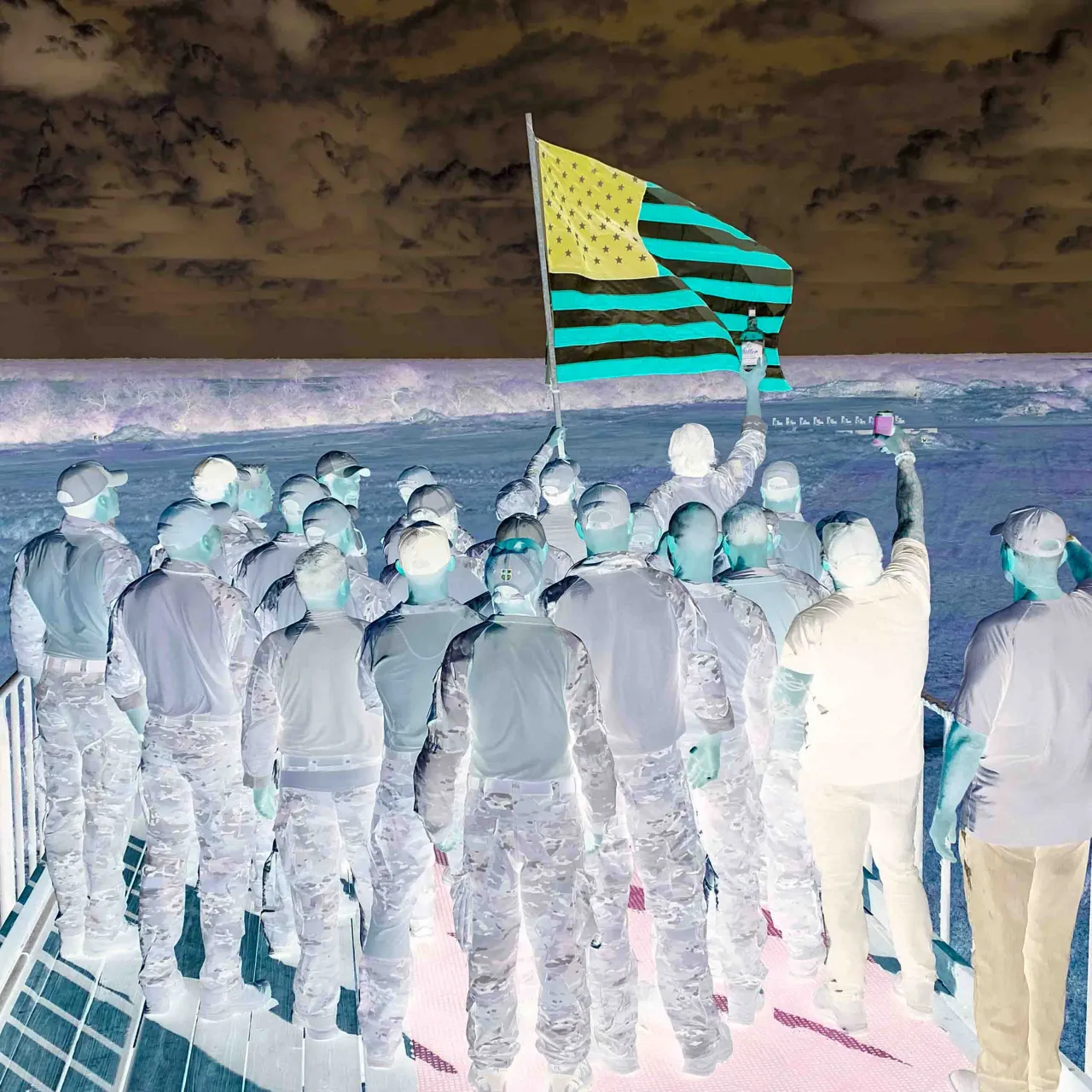 Color-inverted photo of a class group gathered around a raised American flag